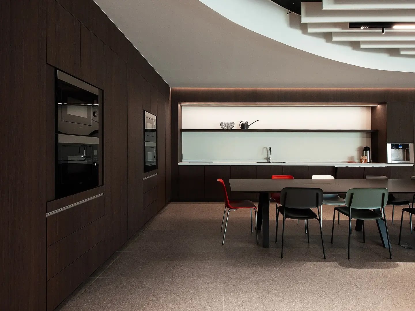 Office kitchen featuring RealGrain Knokke brunette timber-look panels.